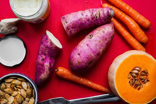 citrus fruit sweet potato, carrots, and squash plant